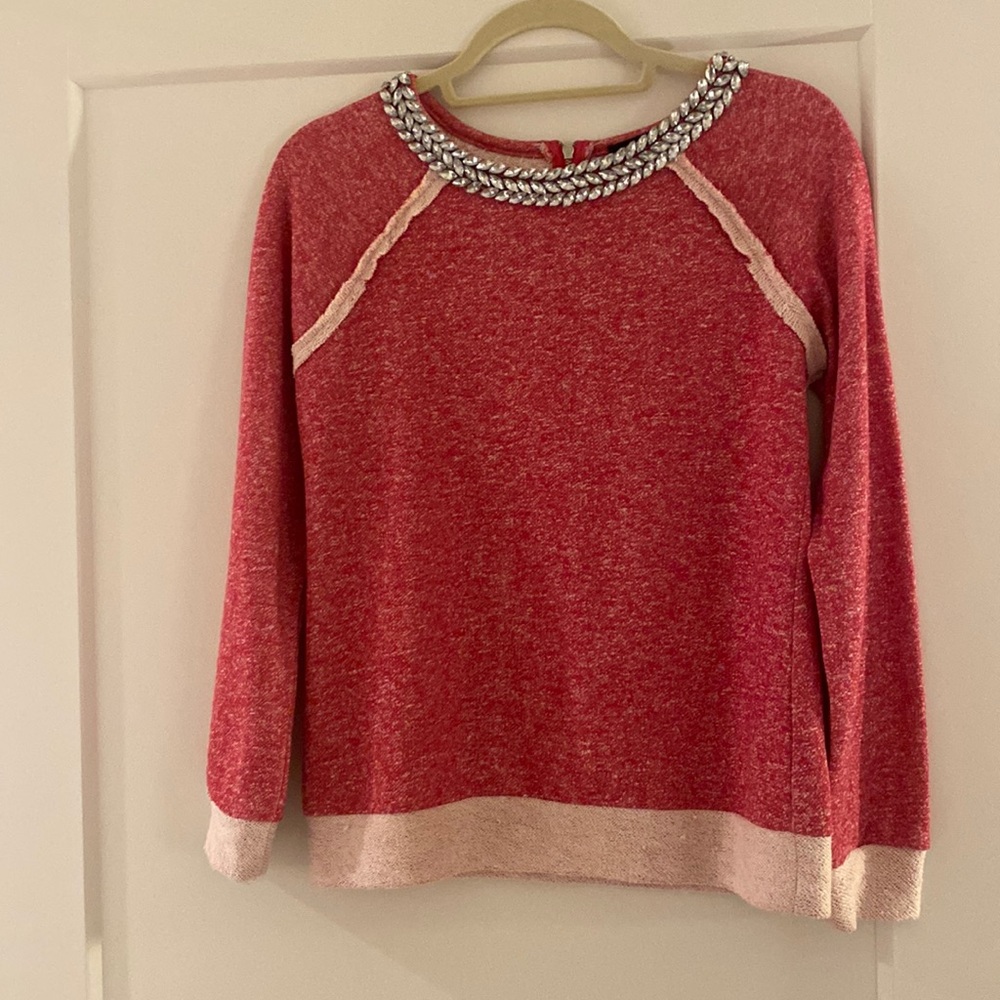 Pink sweater with jeweled collar